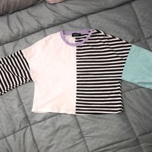 Size M. Oversized sleeve cropped boutique shirt.
